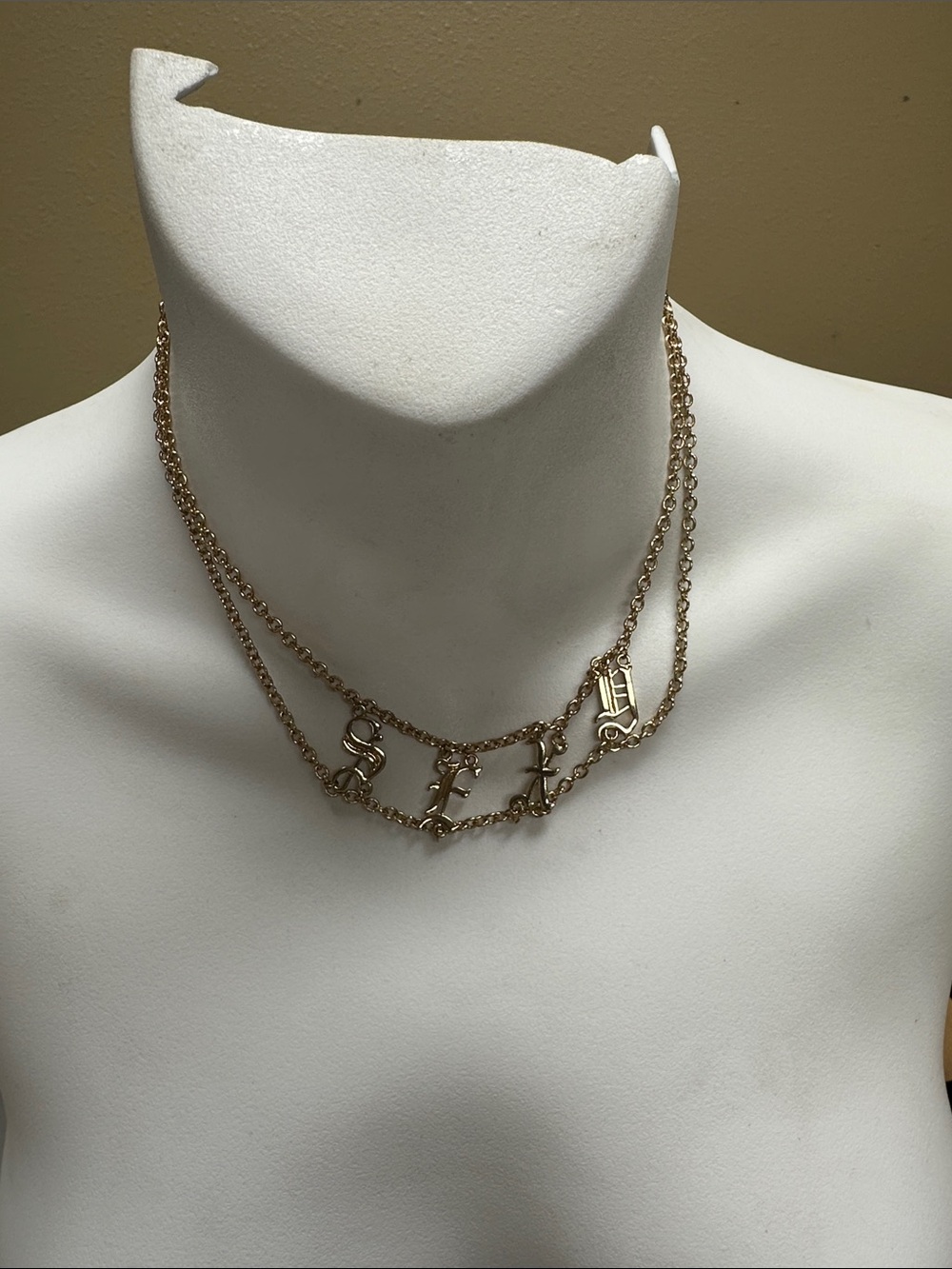 ##124, Guess by Marciano Gold-Tone Sexy Layered Necklace with Letter Charms